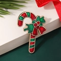 Cartoon candy cane Christmas brooch with red bow and holly leaves in enamel finish - Style 15