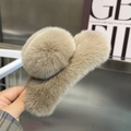 Close-up of a large beige plush faux rabbit fur claw clip with soft texture for winter - Extra Large / Milk Tea