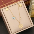 Gouden ketting met blauw hart boze oog en sneeuwvlok hangers in een sieradendoos - Sneeuwvlok Ster en Hart Stijl (3#)