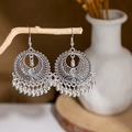 Detail of vintage silver boho earrings with metallic tassels hanging on a branch - E2874-25/Multi-layer Hollow Tassel