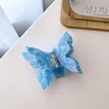 Blue and white marble acetate butterfly hair claw clip with golden metal spring - Light Blue