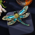 Luxury dragonfly brooch with colorful crystals and gold-plated wings on display box - Light Blue