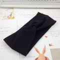 Elastic knitted twist headband for children in black color on decorative card - Black