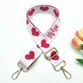 Detail of adjustable nylon strap with red heart pattern and gold metal hooks - Pink Heart