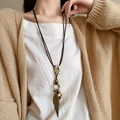 Collier bohème vintage avec plumes en bronze, étoiles et perles sur un long cordon en cuir - 7# Grande Plume Étoile