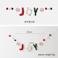 Christmas felt ball garland featuring red and green JOY letters with candy accents - JOY Banner