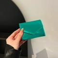 Glossy emerald green envelope-style mini wallet in high-shine faux leather finish - Green