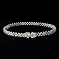 Macro detail of elastic multi-row pearl waist belt with silver floral buckle design - Silver Tone Leaf Flower Artificial Pearl Clasp (Style 8)