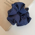 Detailed macro view of dark blue polka dot fabric scrunchie with layered texture - Basic Scrunchie / Dark Blue