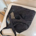 Detail view of large charcoal grey canvas tote bag with textured heavy cotton fabric - Pure Denim Blue