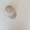 Detail of a breathable beige five-panel camper hat with blue trim and YIJIA embroidery - 52-54cm (3-8 Years) / Khaki