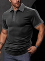 Dettaglio di una polo da uomo con design color-block nero e grigio scuro e colletto - S / Nero