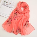 Detail of coral pink chiffon beach scarf with elegant floral embroidery patterns - Bright Red