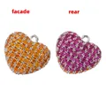 Front and rear views of heart-shaped pendants with pave-set orange and pink zircons - Platinum Orange/Rose Zircon Heart
