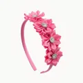 Pink floral headband with sparkling rhinestone centers on a soft fabric wrapped base - Peach