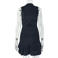 Detail of the cross-wrap chest design and double-layered ruffle hem on this black mini dress - S / Black