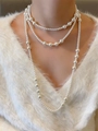 Elegant multi-layered freshwater pearl necklace with alternating sizes on a cable chain - X137 Triple-layer White Glass Bead 140CM
