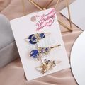 Dreiteiliges goldenes Haarspangen-Set mit blauen Sternen und Monden auf Blumenkarte - Blaue Kombination