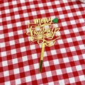 Detail of golden acrylic Merry Christmas cake topper with a green glitter tree - Christmas Tree Gold Merry Christmas