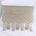 Detail of a square checkered hair claw clip in yellow and grey with a strong 7-tooth grip - Yellow + Grey Plaid
