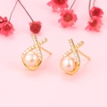Orecchini incrociati dorati con perle d'acqua dolce naturali e zirconi scintillanti - Argento 925 / Perla Rosa (Colore Oro)