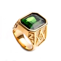Macro shot of gold masonic signet ring with emerald green gem and embossed G symbol - US 7 / Gold Green
