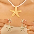 Golden starfish jewelry set with textured pendant necklace and matching drop earrings - Gold Starfish Jewelry Set