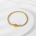 Detail of 18K gold-plated snake bone chain bracelet with round polished clasp - Gold Ball Clasp