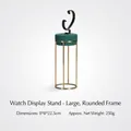 Golden metal watch stand with dark green velvet tray and black display holder - Circle Watch Stand High