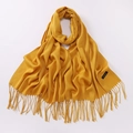 Solid yellow cashmere scarf with tassel fringe details on a clean white background - Yellow