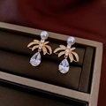 Vintage style gold resin drop earrings featuring white pearls and pear-shaped crystals - Gold Pearl Wing Style