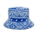 Detailed close-up of navy paisley print on a reversible cotton canvas bucket hat - M (56-58cm) / Blue