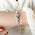 Zilveren kralenarmband met vlinderhanger en verstelbare ketting om een damespols - Matte Vlinder Stijl (E401) / Zilver