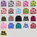 Grid display of 21 colorful Y2K style knitted beanies with Mea Culpa jacquard lettering - 211 / Color 1