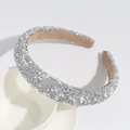 Detailed view of rhinestone and pearl headband with silver shimmering finish and soft lining - Silver