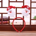 Christmas headband with red spring-loaded Santa Claus figurines and glittery snowflakes - Santa Spring Headband