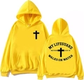 Détail du texte My Lifeguard Walks On Water et de la croix noire sur le sweat à capuche jaune - Jaune