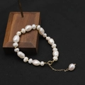 Elegant natural freshwater pearl bracelet featuring golden beads and a lobster clasp finish - Mixed Size Pearl Polished Bracelet