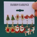 6-pair set of Christmas earrings with Santa, tree, and reindeer designs on a card - 22 Bell Santa Reindeer (6 Pairs Set)