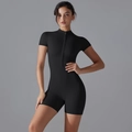 Detail of black slim fit yoga bodysuit with front zipper closure and short sleeves - S / Black