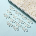 Close-up of white ABS imitation pearl bow charms for DIY phone case and craft decoration - 1x1.8cm / Off White