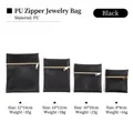 Bolsas para joyas de cuero PU negro con cremallera dorada en cuatro tamaños - 8*8cm / Negro