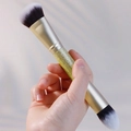 Detailed close-up of double-ended foundation brush with golden glitter handle and soft bristles - Angled & Tapered Glitter Gold Handle