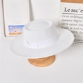 Detail of white wide brim felt fedora with matching ribbon on a wooden stand - Adult / White (Bow)