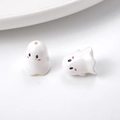 Close-up of white acrylic cartoon ghost beads with pink cheeks for DIY jewelry making - 17*15mm / White