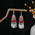 Ethnic bohemian silver-tone dreamcatcher earrings with vibrant red beads and feathers - Dreamcatcher Feather Tassel Red Style (E1201-2/Red)