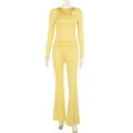 Detail of yellow knit set featuring square neck top and ruched high waist flare pants - XS / Yellow