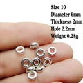 Close-up of 6mm silver alloy spacer beads for jewelry making showing size and detail - 10# (Diameter 6mm/Smooth)