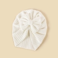 Neugeborene Baby Turban Hut weiß mit großer Strickschleife und geripptem Stretchdesign - Weiß
