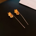 Elegant gold flower drop earrings with hammer texture finish on dark background - Gold Flower Shaped Frosted Ear Thread (50#)